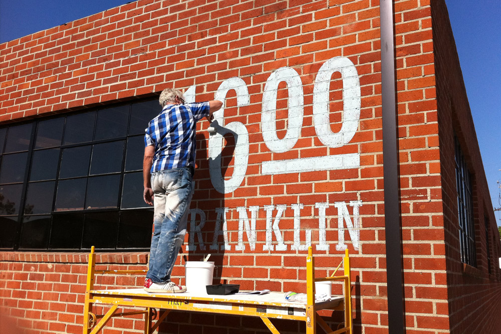 1600 E. Franklin hand-painted sign