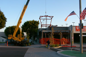 Good Stuff Lifeguard Tower crown being lowered onto building - thumb